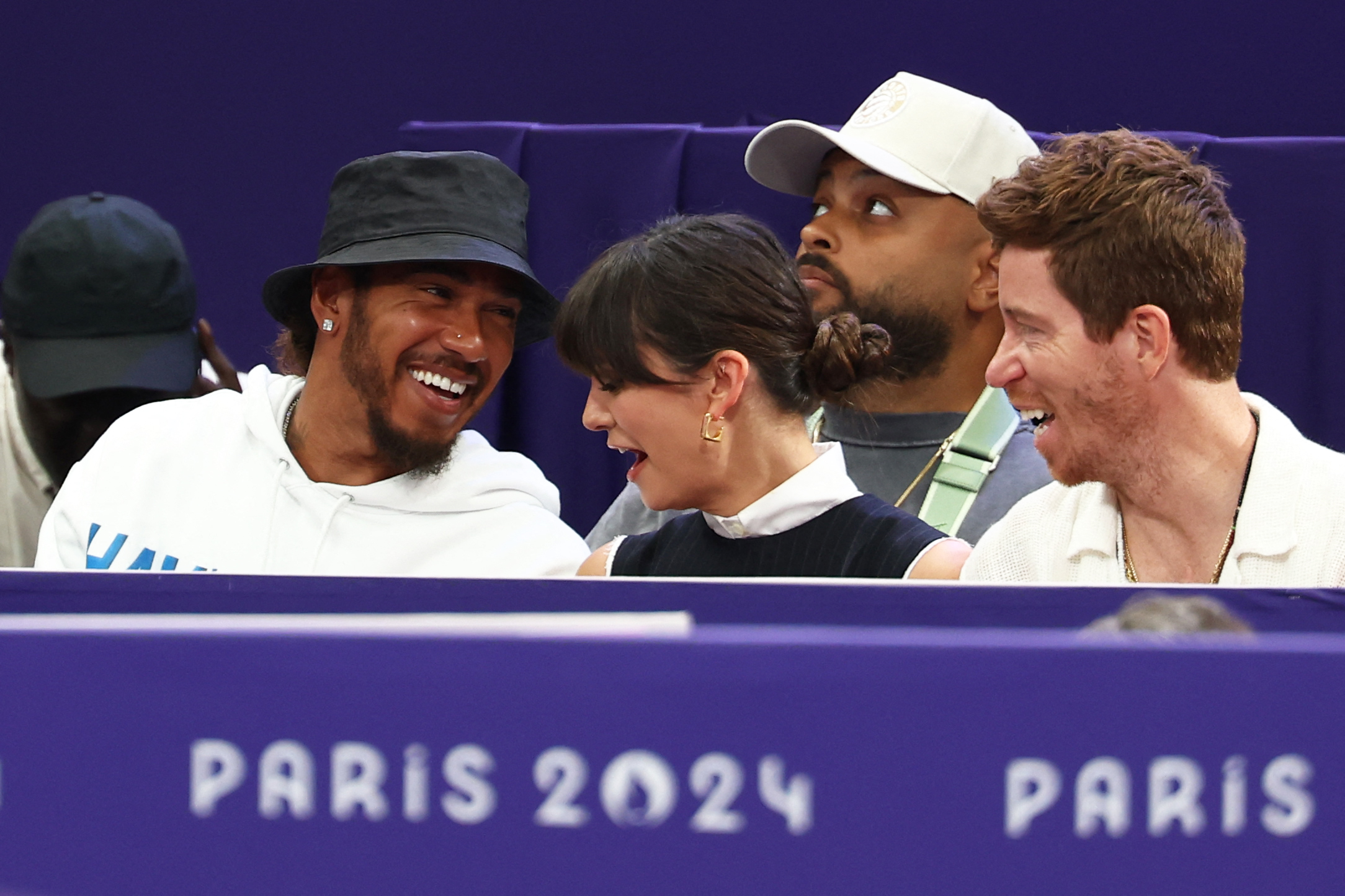 Lewis Hamilton and Canadian actress Nina Dobrev joined them at the men's foil fencing final